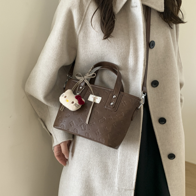 Ženska torba 2025, vrhunska tekstura, nišni dizajn, jesen-zimski retro stil, crossbody bucket torba
