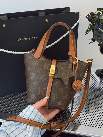 Gutico 2025 Ženska bucket bag s crossbody remenom, PVC, srednja veličina, podstava poliester
