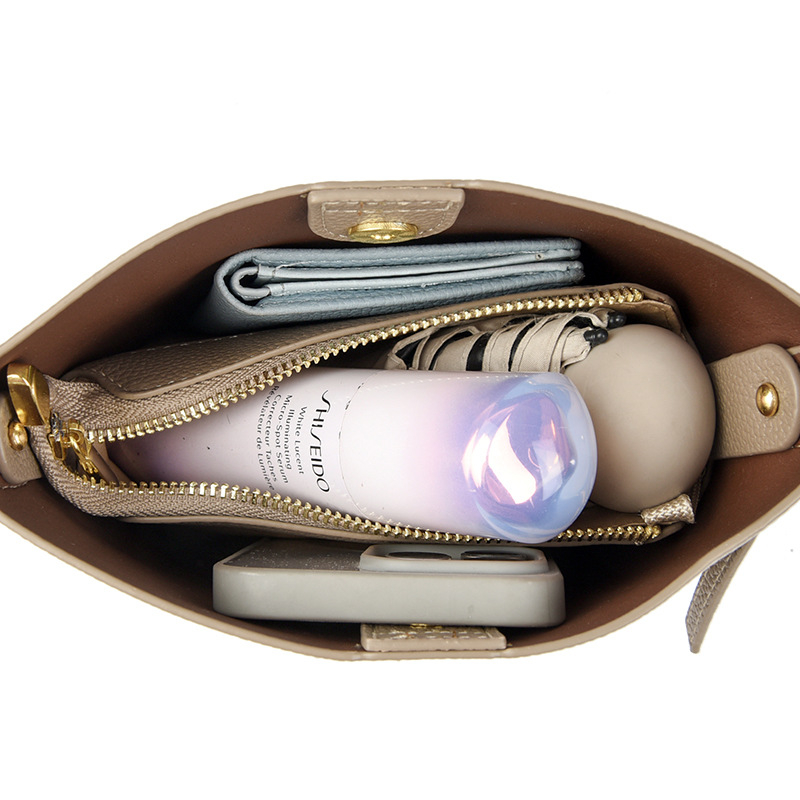 Ženska kožna bucket bag, urbani stil jednostavnosti, model 2025, prostrana dnevna torba s jednom naramenicom