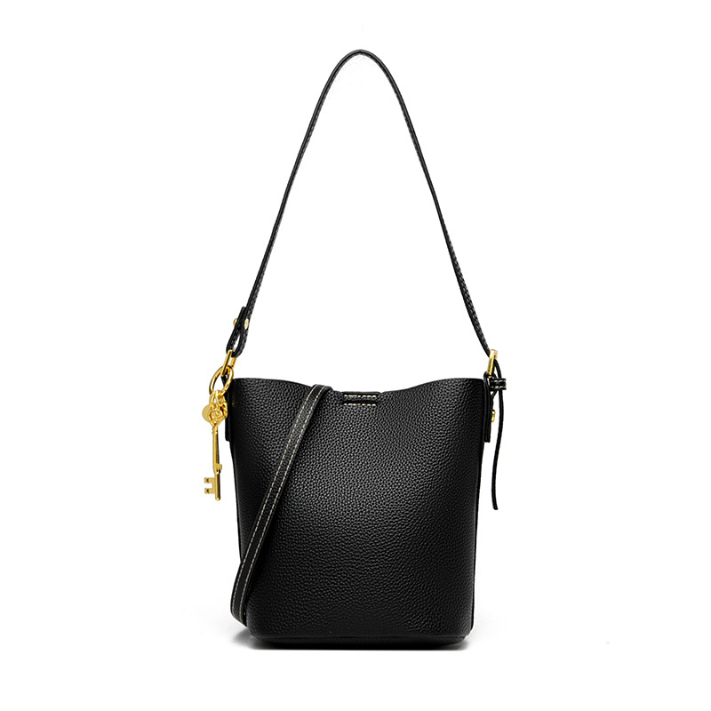 Ženska kožna bucket bag, urbani stil jednostavnosti, model 2025, prostrana dnevna torba s jednom naramenicom