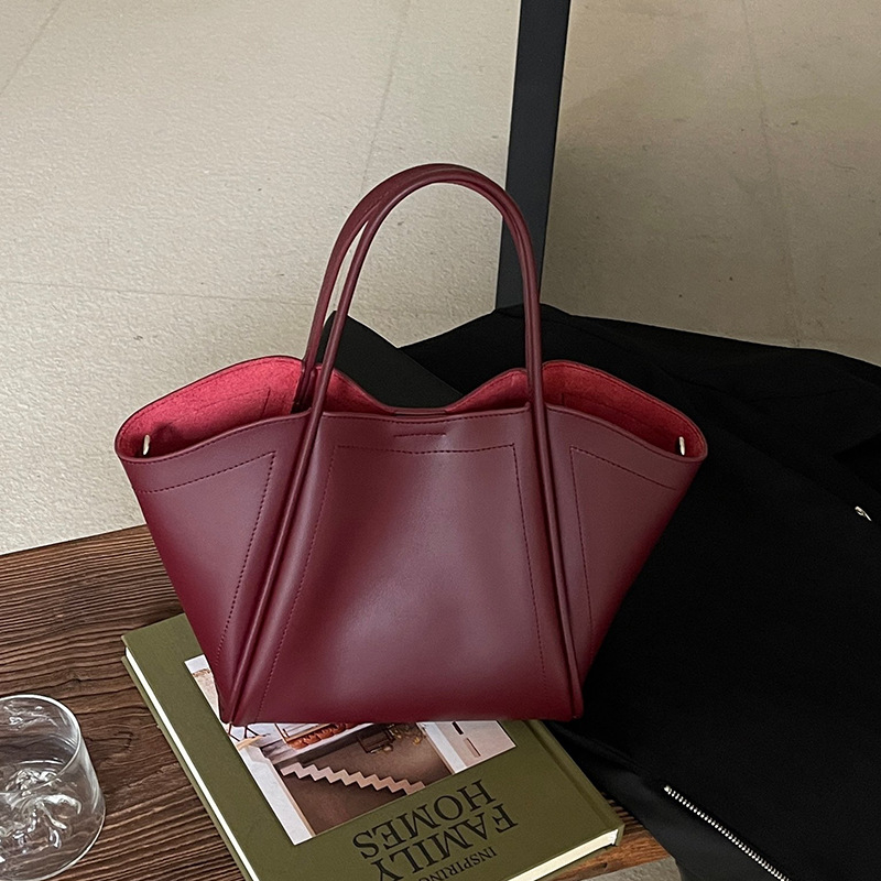Ženska torba od prave kože s dizajnom krila, kolekcija 2025, velika kapaciteta, za rameno ili crossbody, za svakodnevnu uporabu