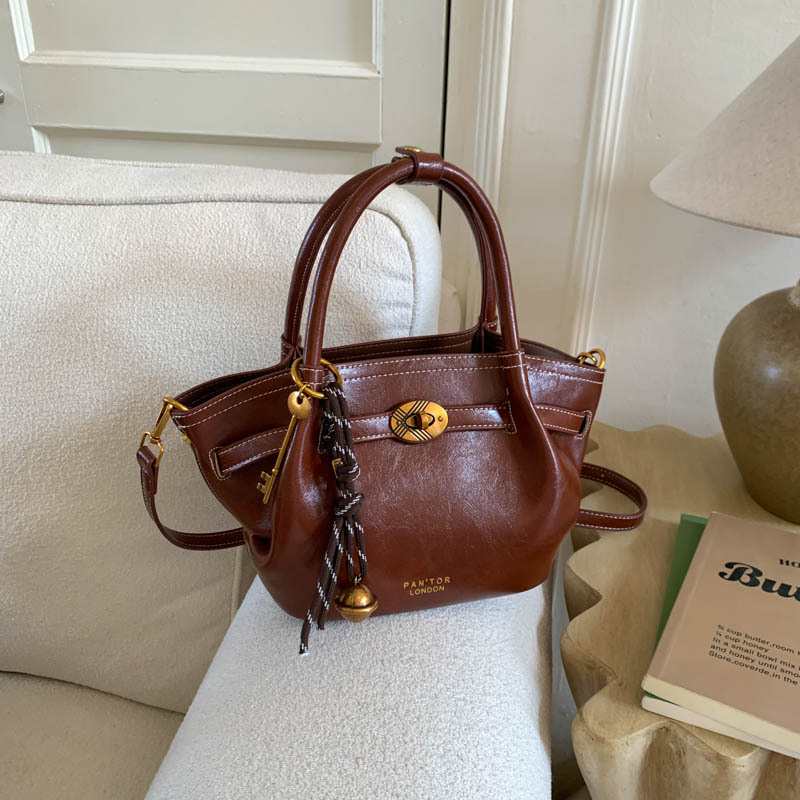 Minimalistična torbica u stilu košare sa zatvaračem, bucket bag s jednom naramenicom za žene, jesen–zima 2025, crossbody torba majka-kćer