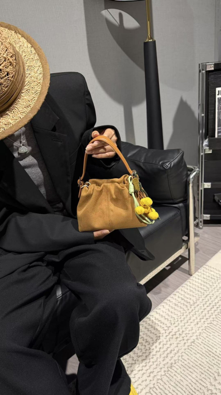 Ženska torba u korejskom stilu, oblik kofa, mala kožna crossbody torba, ljeto 2026