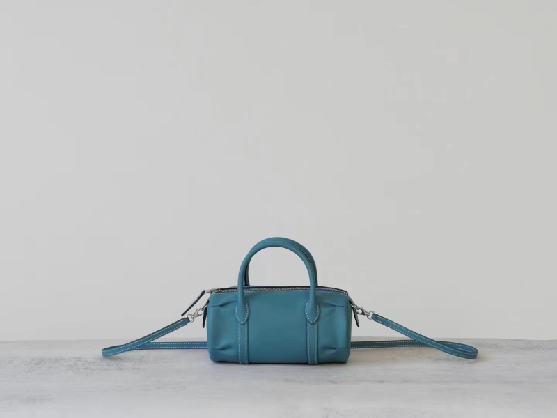 Ma's Mini Pillow Bag, vrhunska kravlja koža, Boston stil, kompaktna torba za rame i crossbody