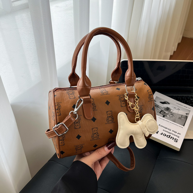 Tisnuta cilindrična torba Boston, nišnoga dizajna, svestrana torba za rame i crossbody, svjež stil, ženska torba