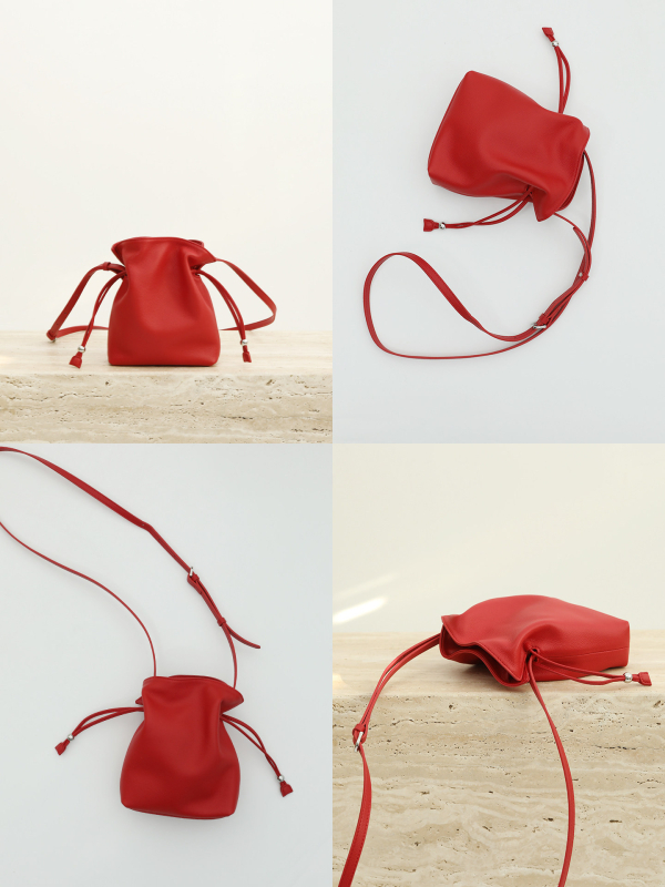 Ženska bucket torba s vezicom, mala, od prave kože, s jednom naramenicom i mogućnošću nošenja kao crossbody, gradski minimalistički stil, 2026