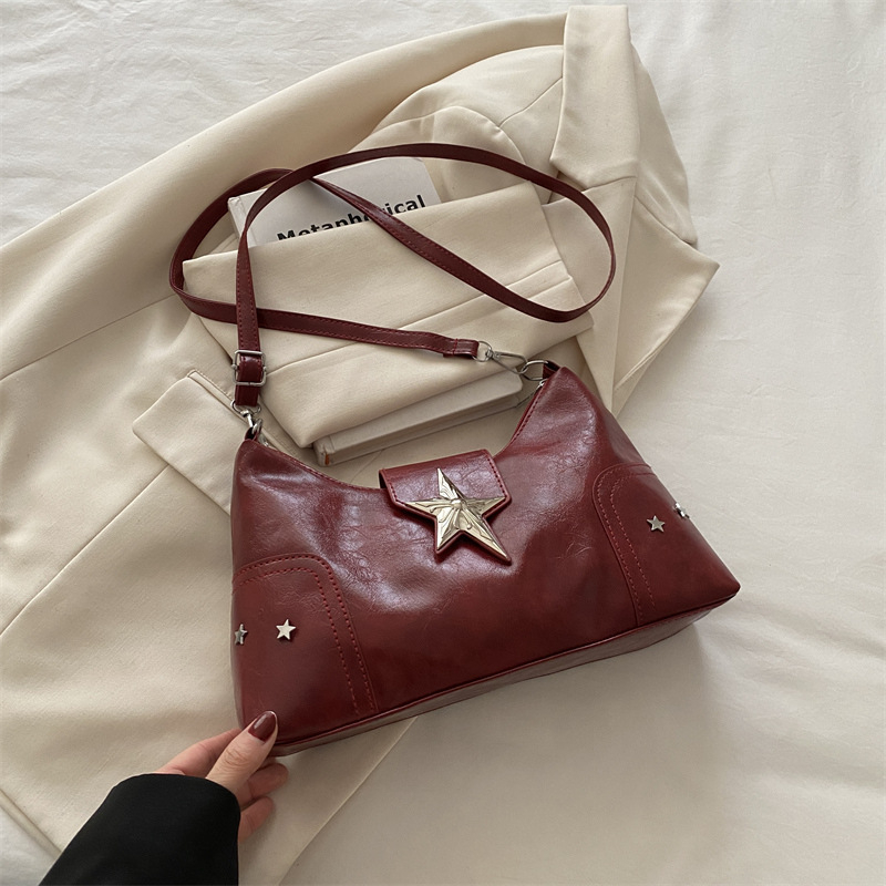 Ženska torbica s polumjesečnim oblikom, moderan nišni dizajn, proljeće 2025, svakodnevna crossbody torba