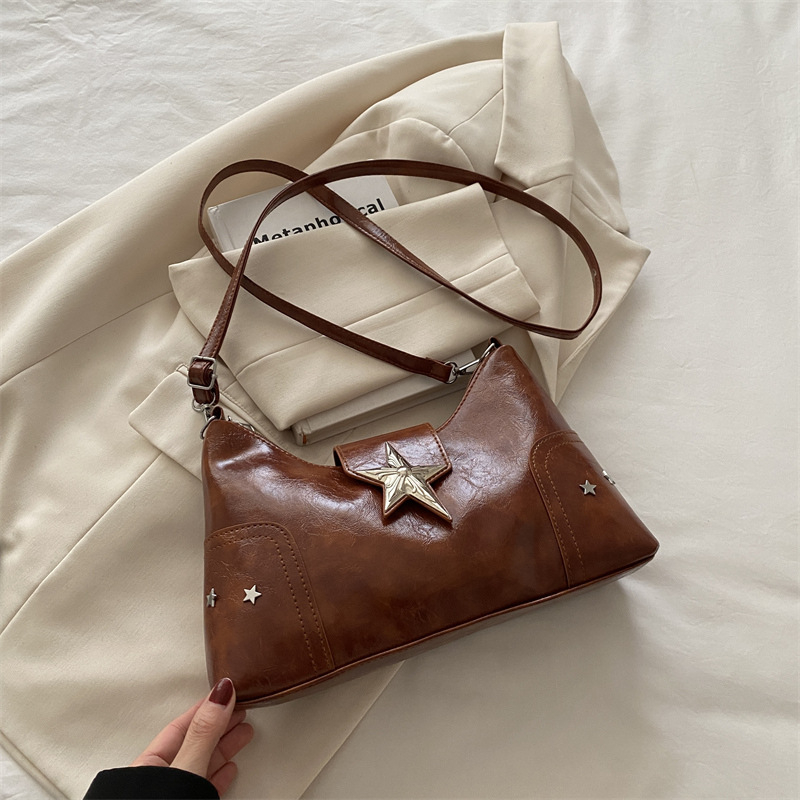 Ženska torbica s polumjesečnim oblikom, moderan nišni dizajn, proljeće 2025, svakodnevna crossbody torba