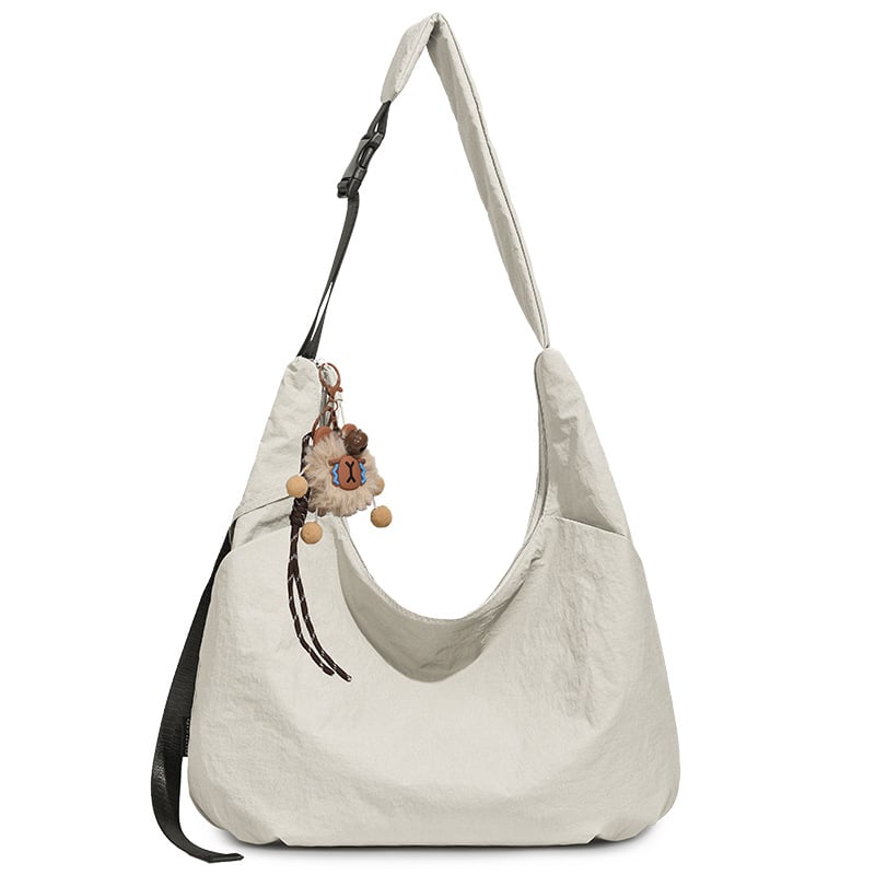 Ženska crossbody torbica u obliku polumjeseca, dumpling stil, Oxford tkanina, proljeće 2026