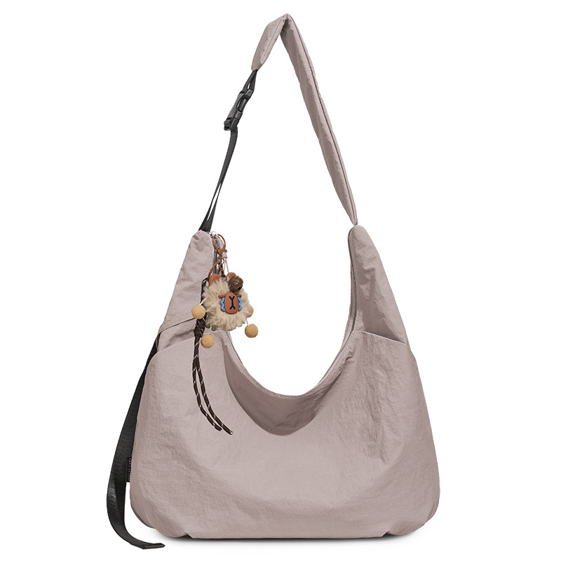 Ženska crossbody torbica u obliku polumjeseca, dumpling stil, Oxford tkanina, proljeće 2026