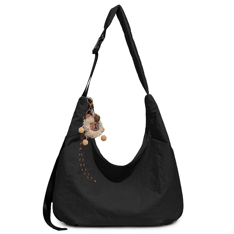 Ženska crossbody torbica u obliku polumjeseca, dumpling stil, Oxford tkanina, proljeće 2026