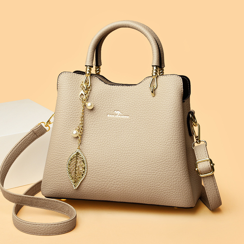 Ženska torba 2025, prirodna koža, velika kapaciteta, tri pretinca, crossbody torba