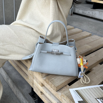 2026 nova luksuzna minimalistička bucket torba za žene, svestrana za ramena i crossbody, koža s zrnatom teksturom Kelly torba