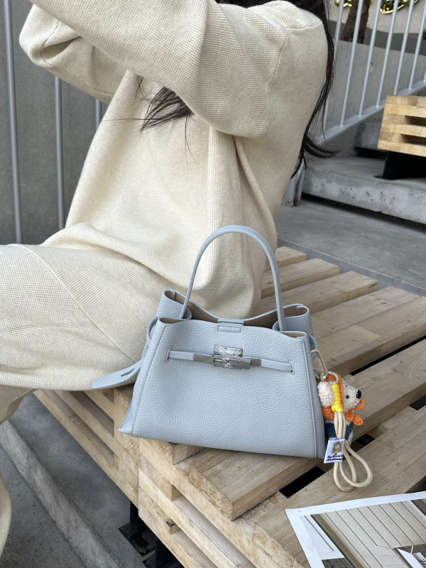 2026 nova luksuzna minimalistička bucket torba za žene, svestrana za ramena i crossbody, koža s zrnatom teksturom Kelly torba
