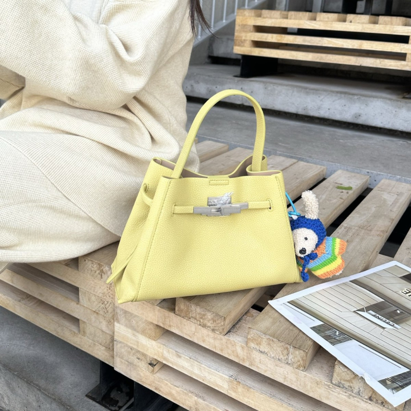 2026 nova luksuzna minimalistička bucket torba za žene, svestrana za ramena i crossbody, koža s zrnatom teksturom Kelly torba