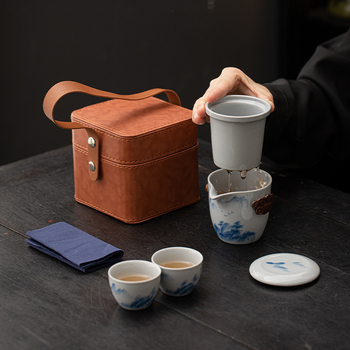 Set de ceai ceramic pentru călătorii, în stil chinezesc nou, pictat manual, pentru camping în aer liber și mașină — un ceainic și două cești, portabil
