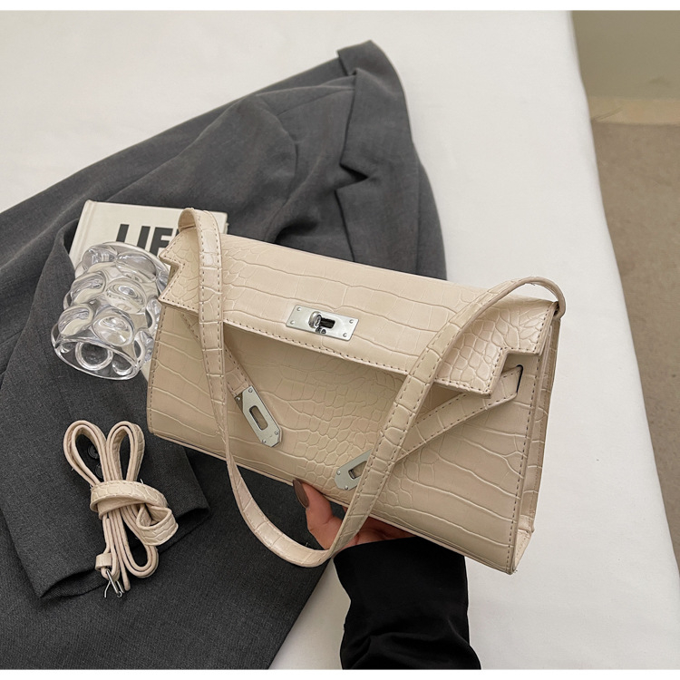 Ženska Kelly torba s uzorkom krokodila, s ramenskim i crossbody stilom, baguette silueta, zima 2024