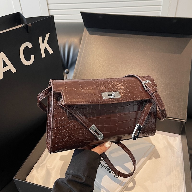 Ženska Kelly torba s uzorkom krokodila, s ramenskim i crossbody stilom, baguette silueta, zima 2024