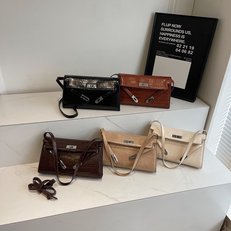 Ženska Kelly torba s uzorkom krokodila, s ramenskim i crossbody stilom, baguette silueta, zima 2024