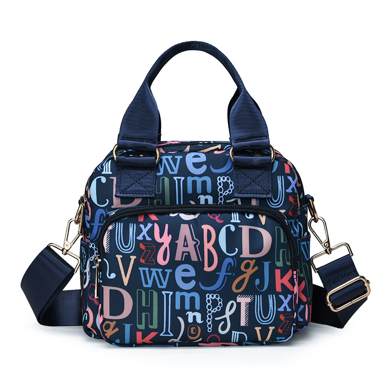 Svestrana ženska torba za rame, crossbody, s otiskom, od najlona, vodootporna
