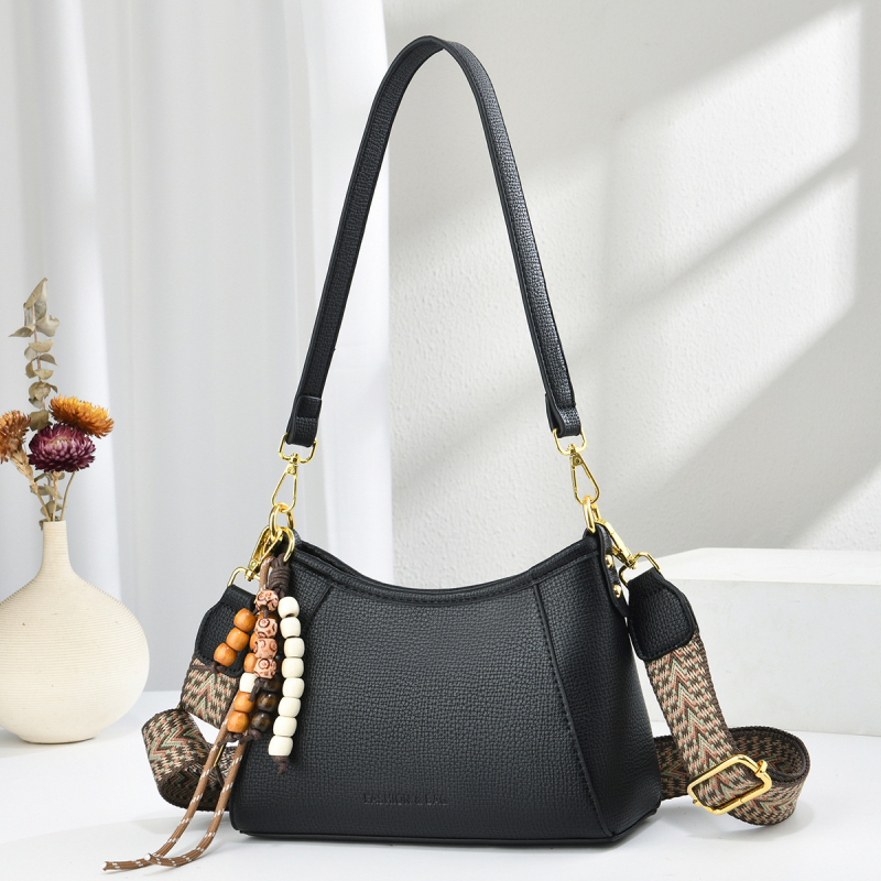 Ženska torba u franuskome stilu – moderna svakodnevna crossbody torba s retro šarmom