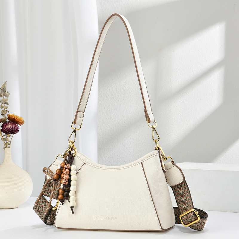 Ženska torba u franuskome stilu – moderna svakodnevna crossbody torba s retro šarmom
