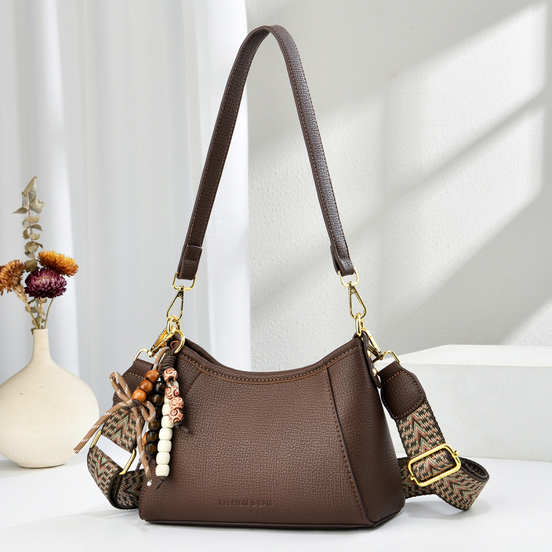 Ženska torba u franuskome stilu – moderna svakodnevna crossbody torba s retro šarmom