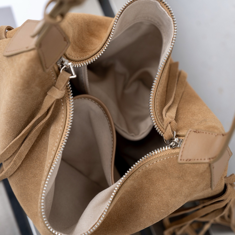 Torba s nišnim dizajnom: ljeto 2025, ženska retro torba s resicama, crossbody tote od prave kože