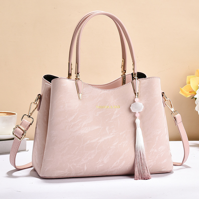 Ženska torba 2025, lagana luksuzna torba za ručno nošenje i crossbody, svakodnevni stil