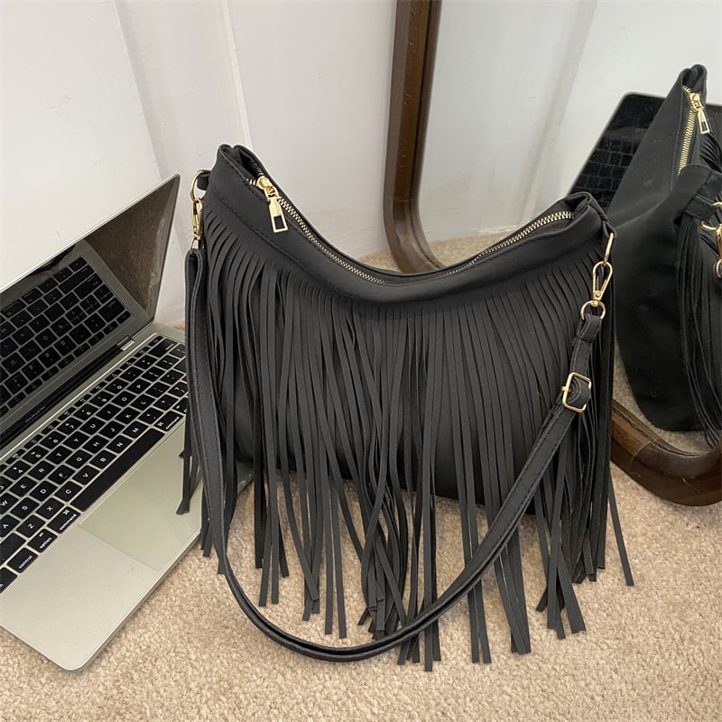 Ženska torbica s resicama, korejskog stila, velika kapaciteta, proljeće 2026, minimalistički dizajn za rame ili crossbody.