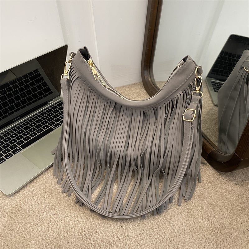 Ženska torbica s resicama, korejskog stila, velika kapaciteta, proljeće 2026, minimalistički dizajn za rame ili crossbody.