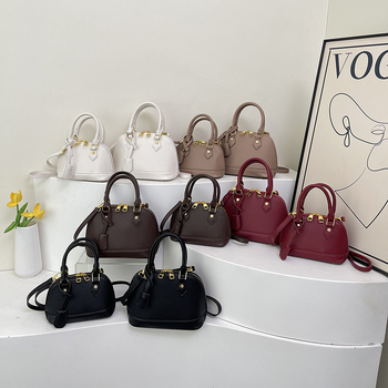 Ženska PU kožna crossbody torba u obliku školjke s lychee teksturom