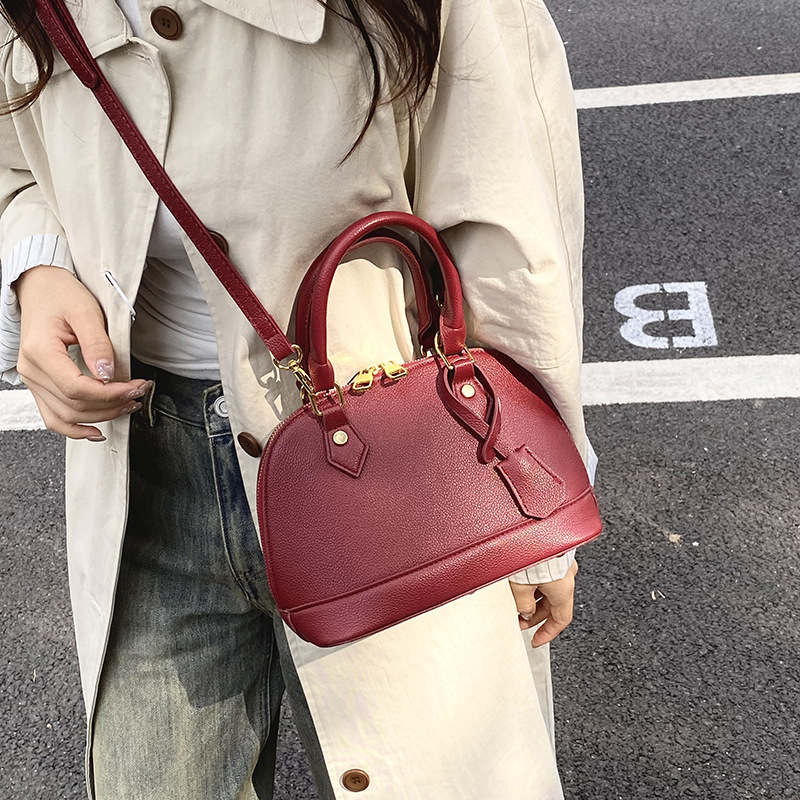 Ženska PU kožna crossbody torba u obliku školjke s lychee teksturom