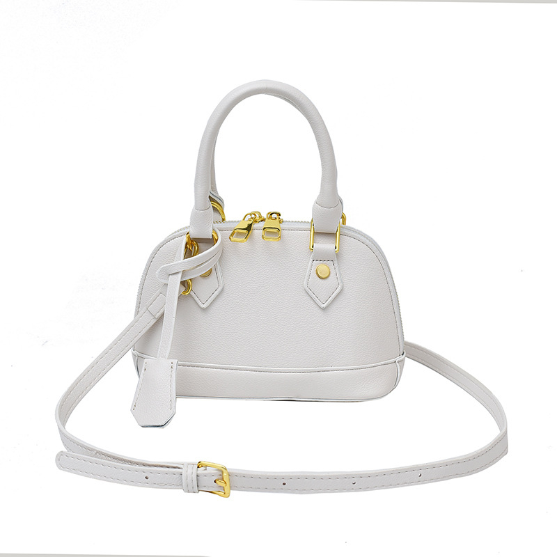 Ženska PU kožna crossbody torba u obliku školjke s lychee teksturom