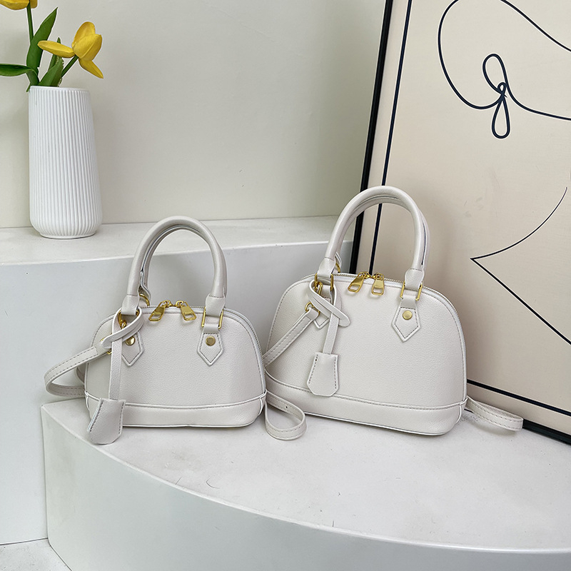 Ženska PU kožna crossbody torba u obliku školjke s lychee teksturom