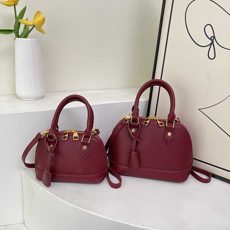 Ženska PU kožna crossbody torba u obliku školjke s lychee teksturom