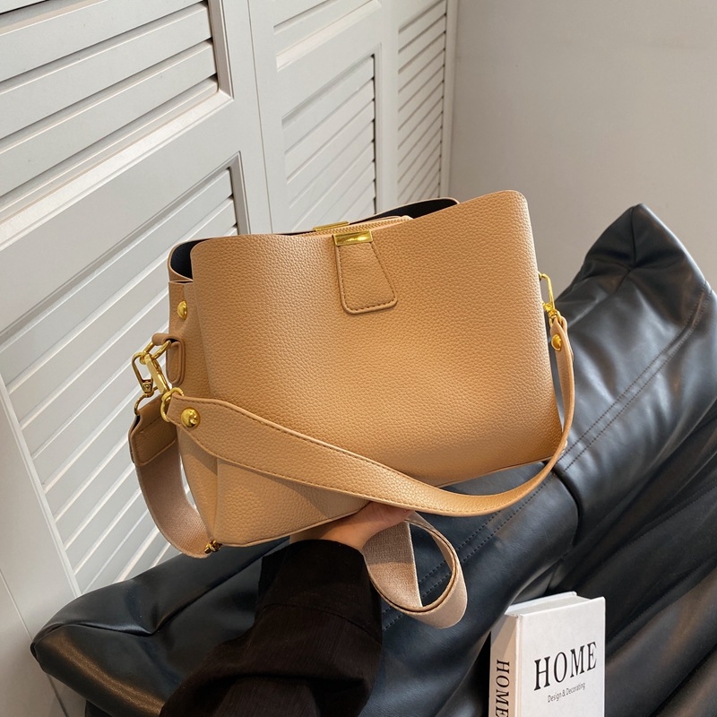 Ženska bucket torba, proljeće 2025 — jednostavna, moderna, crossbody za svakodnevnu upotrebu