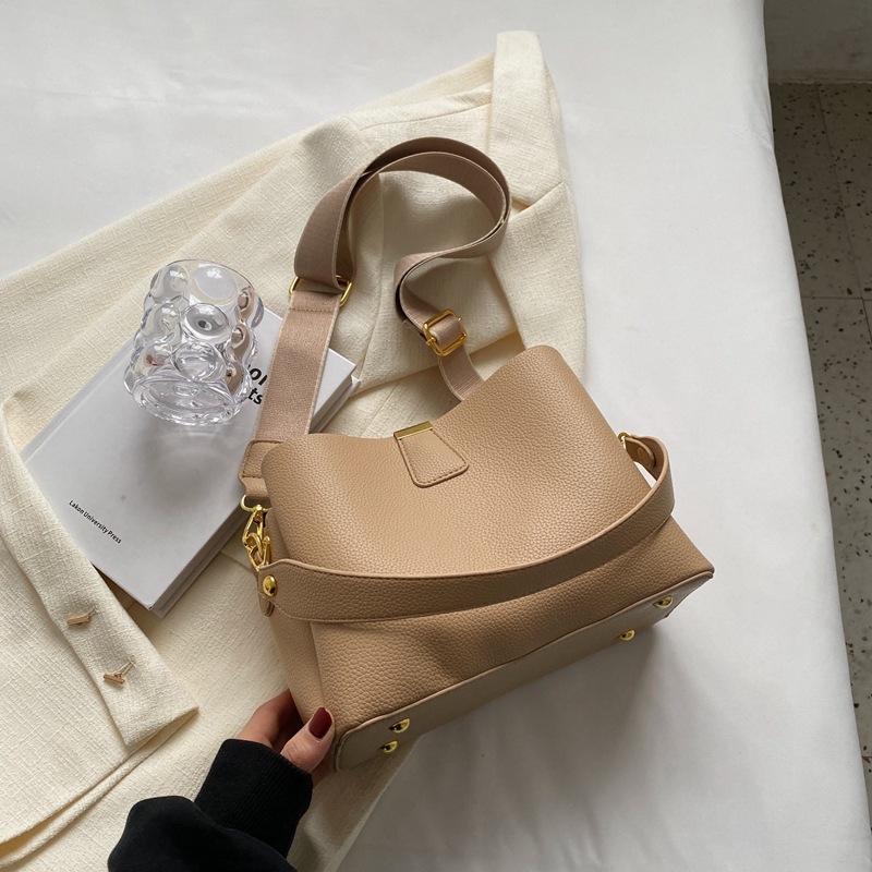 Ženska bucket torba, proljeće 2025 — jednostavna, moderna, crossbody za svakodnevnu upotrebu
