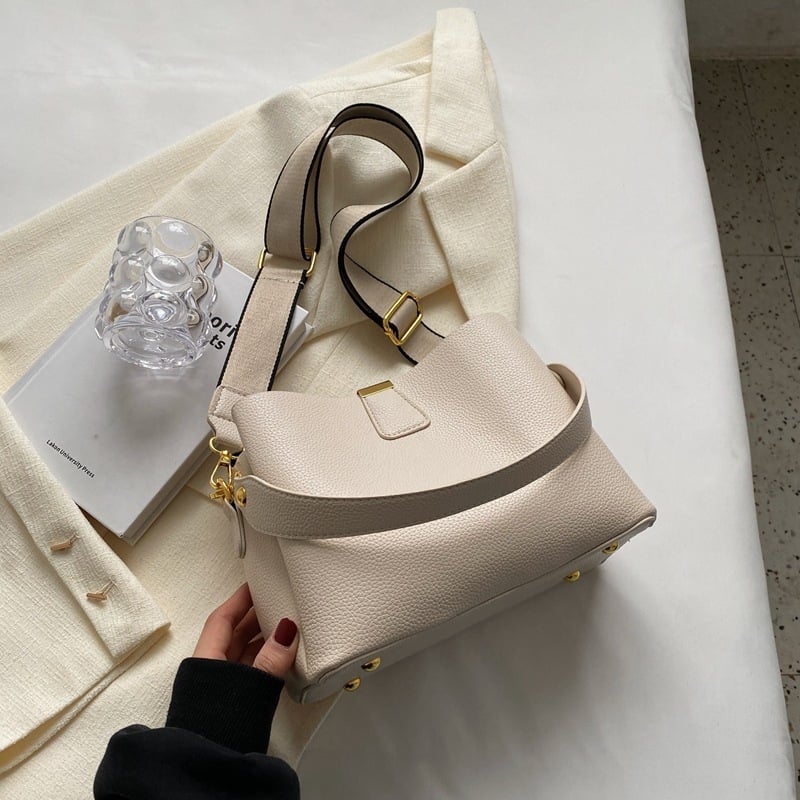 Ženska bucket torba, proljeće 2025 — jednostavna, moderna, crossbody za svakodnevnu upotrebu
