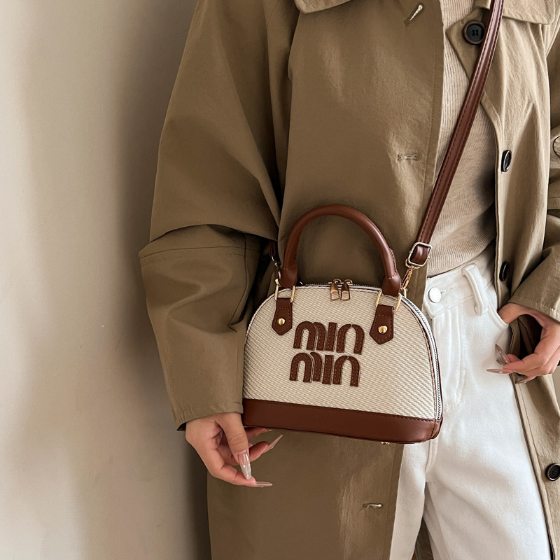 Ženska crossbody torba preko ramena u obliku školjke, teksturirana PU koža, svakodnevna elegantna torba