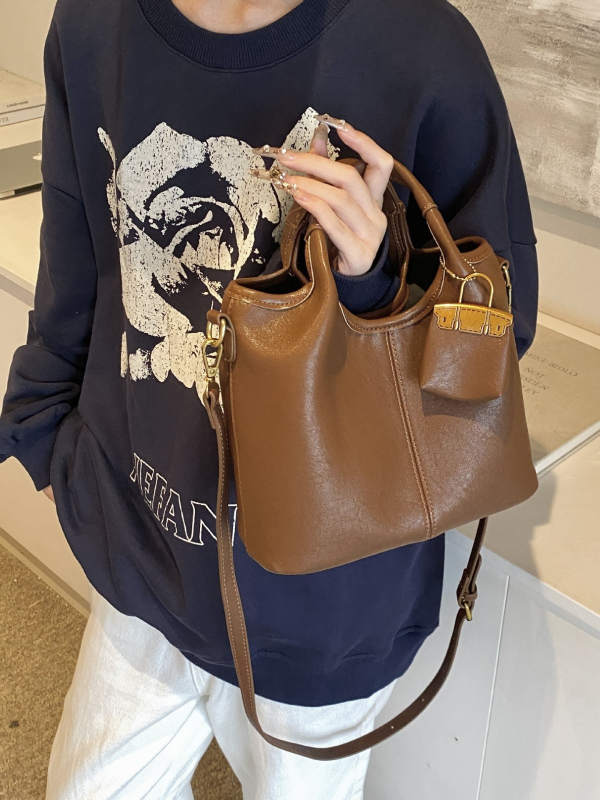 Ženska jesenska retro bucket torba, 2024 novi model, svestran nišni dizajn, preko ramena i crossbody, srednja veličina