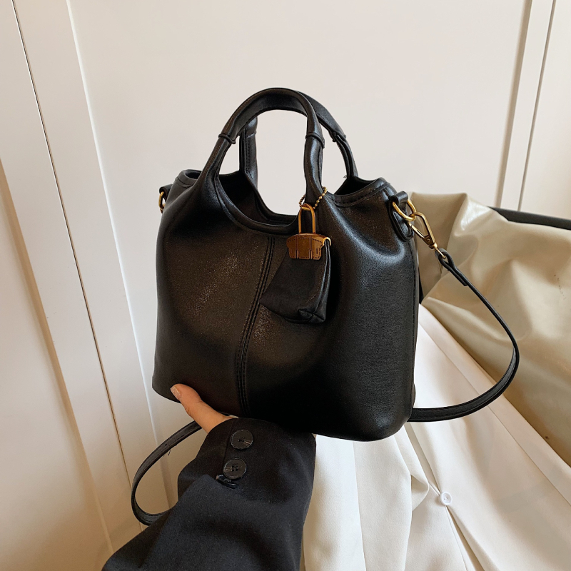 Ženska jesenska retro bucket torba, 2024 novi model, svestran nišni dizajn, preko ramena i crossbody, srednja veličina