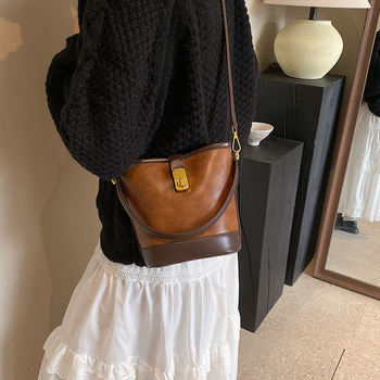 Ženska bucket torba, retro minimalistički stil, crossbody torba za svakodnevnu upotrebu, proljeće 2026