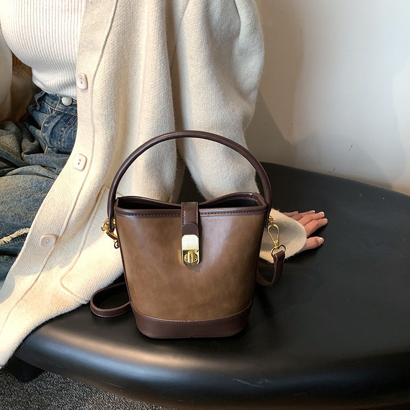 Ženska bucket torba, retro minimalistički stil, crossbody torba za svakodnevnu upotrebu, proljeće 2026
