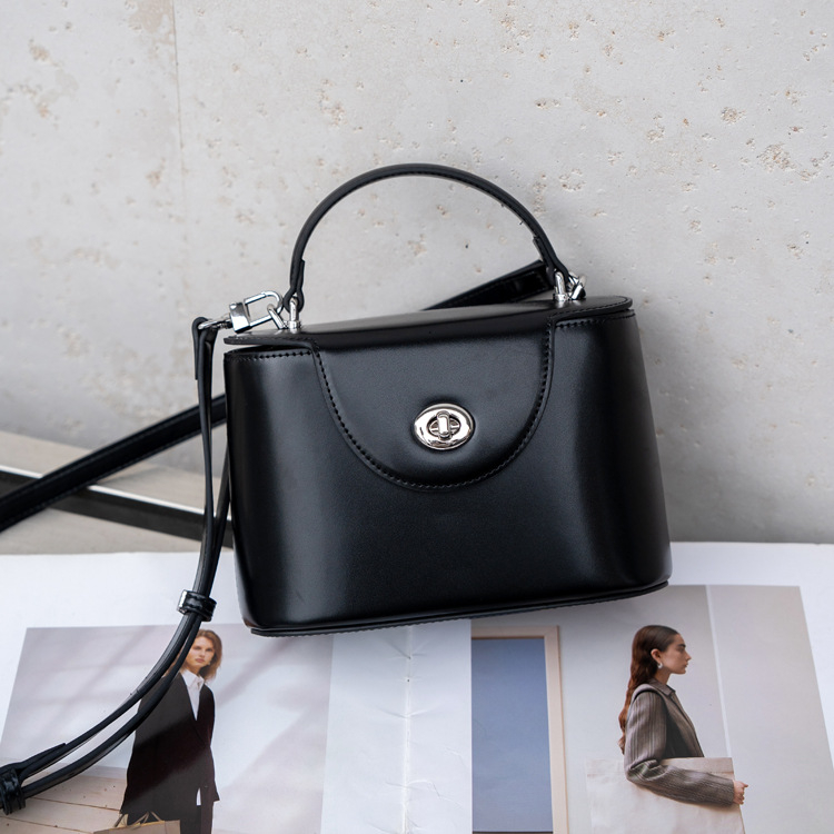 Ženska kožna kutija torba – minimalistički luksuz, moderan gradski stil, mala veličina, na rame ili crossbody