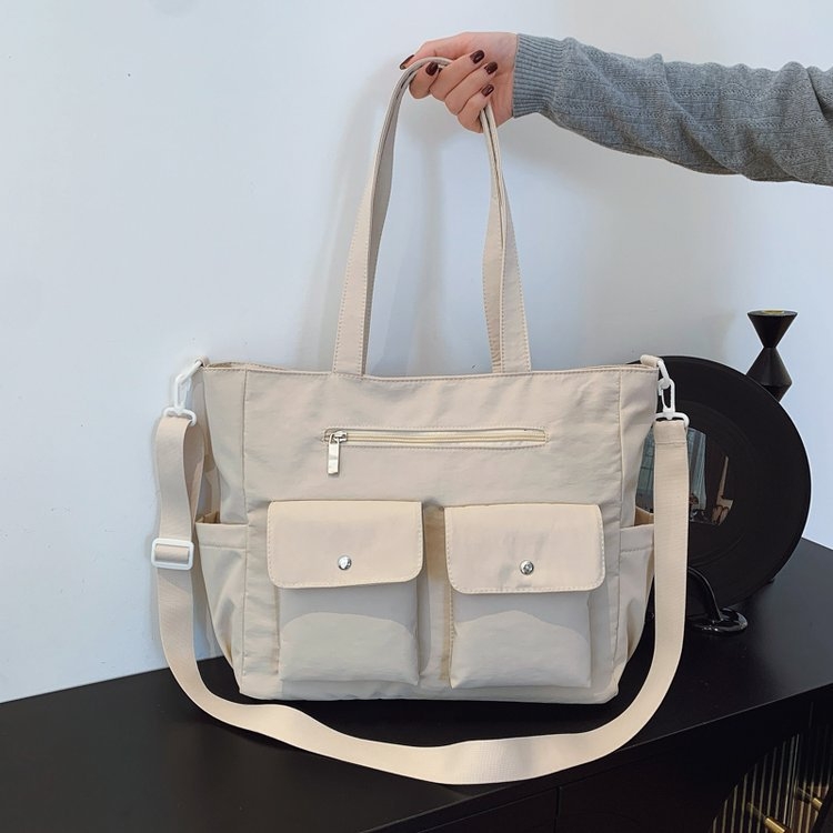 Tote torba velikog kapaciteta za studente, s ručkom, naramenicama i crossbody trakom, modernog i minimalističkog dizajna, s mnogim džepovima