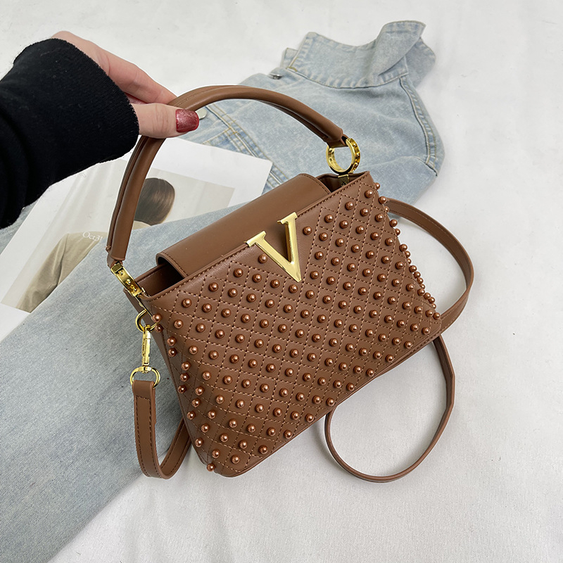 Ženska torbica s perlama, gradski minimalistički stil 2025, mala PU crossbody torbica s unutarnjim džepovima za telefon i ID.