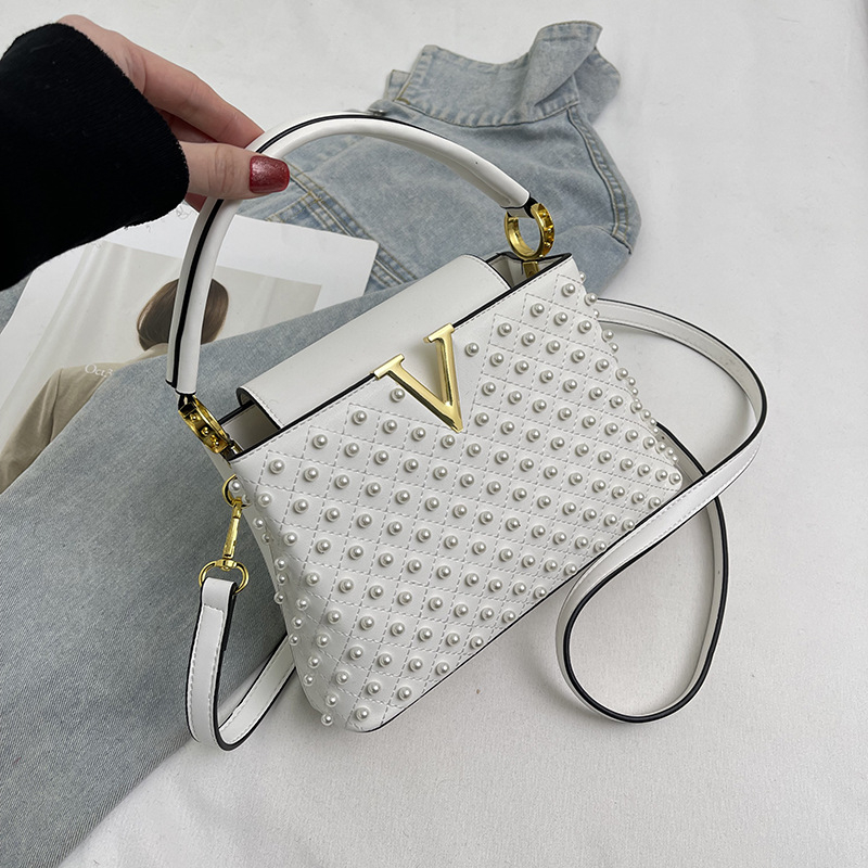 Ženska torbica s perlama, gradski minimalistički stil 2025, mala PU crossbody torbica s unutarnjim džepovima za telefon i ID.