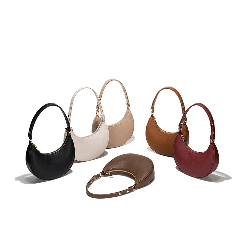 Ženska torba ispod pazuha, ljetna crossbody torba preko ramena, baguette torba u obliku polumjeseca, Instagram inspiracija, model 2026