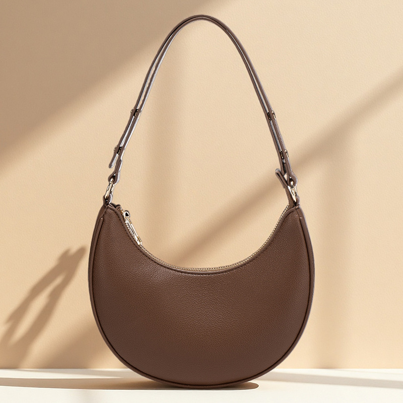 Ženska torba ispod pazuha, ljetna crossbody torba preko ramena, baguette torba u obliku polumjeseca, Instagram inspiracija, model 2026
